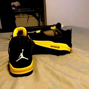 Yellow Thunder Jordan 4s